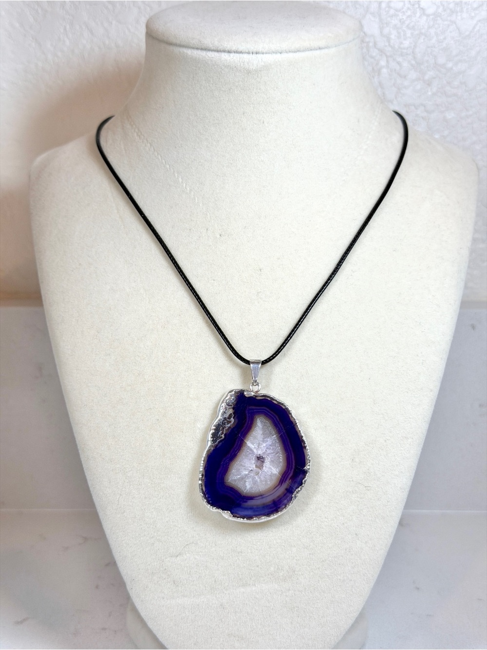 Purple Agate sliced Geode pendant edged with Silver
